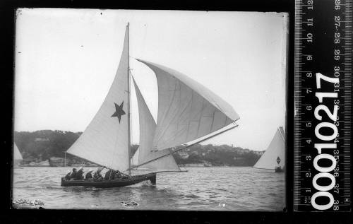 18-footer CALEDONIA sailing on Sydney Harbour 1922