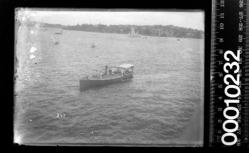 Imperial Japanese Navy visit - delegation on a steam launch flying the Japanese flag