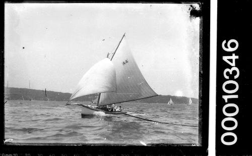 Small yacht with the number '44' on the mainsail, Sydney Harbour