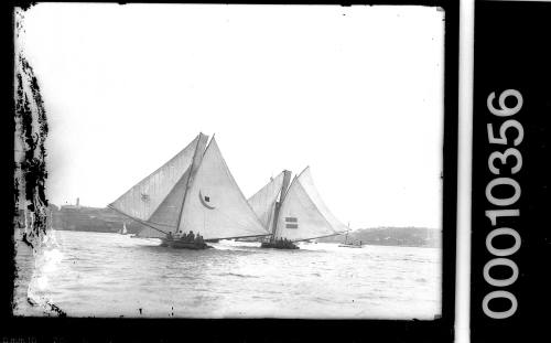 18-footers EILEEN and HC PRESS under sail on Sydney Harbour