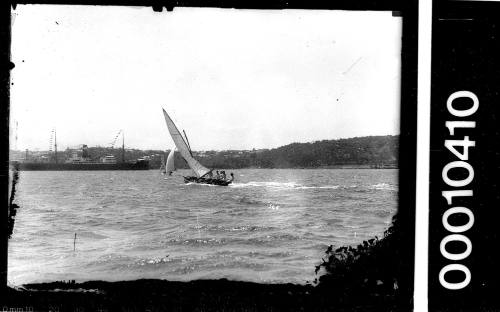 16-foot skiff under sail on Sydney Harbour