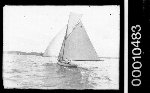 AOMA under sail on Sydney Harbour with the number '2' displayed on the mainsail