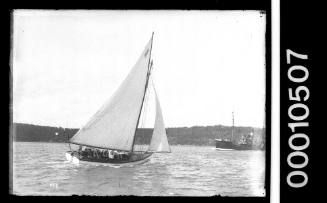 Sailing vessel on Sydney Harbour with the text 'A 6' displayed on the mainsail