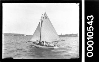 Clinker built boat sailing on Sydney Harbour