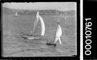 Prince class yacht P3 overhauls a 12-foot skiff on Sydney Harbour