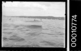 Unfocused image of a speedboat on Sydney Harbour