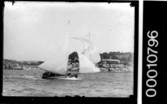 Unidentified 18-footer passes Steel Point on Sydney Harbour