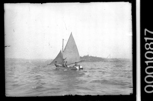 Clinker built boat near Garden Island, Sydney Harbour