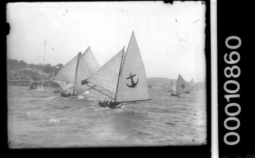 The 18-footer fleet racing on Sydney Harbour