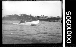 Speedboat POPALONG passing  St George Motor Boat Club