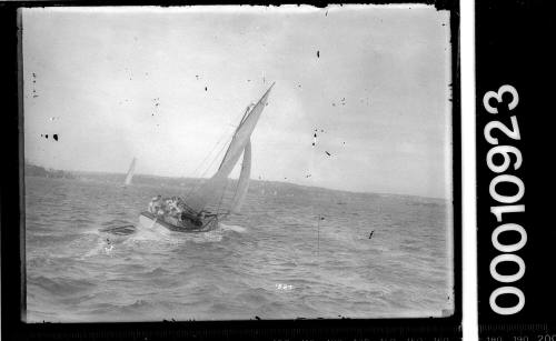 Half-decked yacht on a pleasure sail on Sydney Harbour