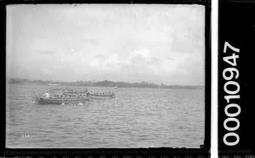 Rowing race off Garden Island, Sydney Harbour