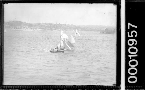 12-foot skiffs sailing near Garden Island, Sydney Harbour