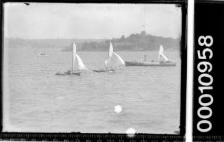 16-foot skiffs and naval launch near Garden Island, Sydney Harbour