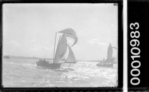 18-footer HC PRESS racing near Bradleys Head light, Sydney Harbour