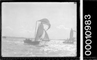 18-footer HC PRESS racing near Bradleys Head light, Sydney Harbour