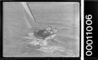 Half-decked yacht sailing on Sydney Harbour