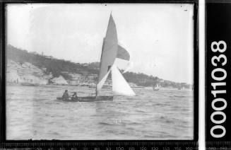 16-foot skiff sailing near shoreline, Sydney Harbour