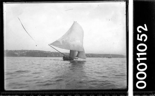 18-footer with ballooning spinnaker on Sydney Harbour