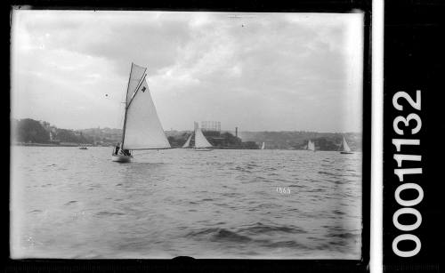 Yacht heading up Harbour with the number '32' on the mainsail, Sydney Harbour