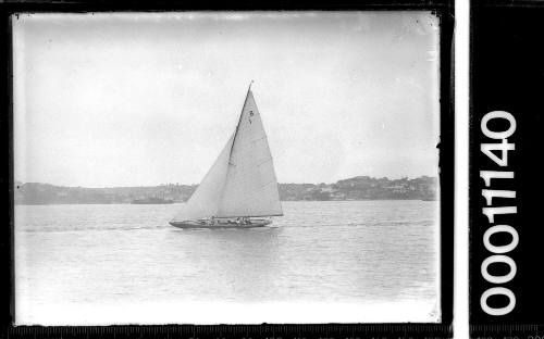 8-metre class yacht with sail number 1 sailing on Sydney Harbour