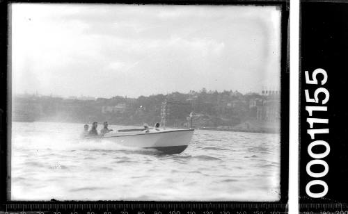 Speedboat  on main Sydney Harbour , possibly timber hull.