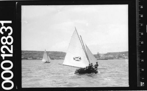 Stern view of a yacht under sail on Sydney Harbour