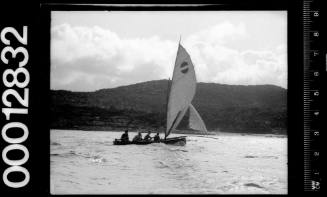 Starboard view of yacht under sail with jib and long bowsprit, Sydney Harbour