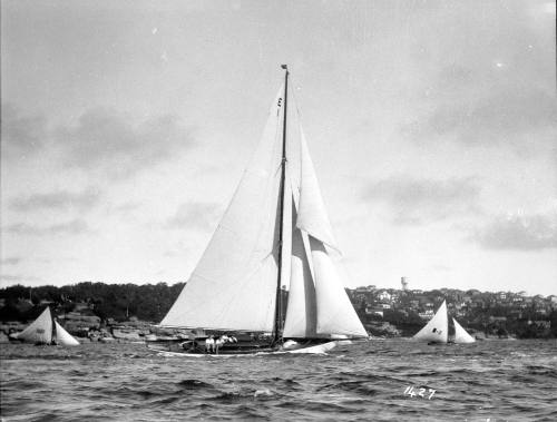 Racing yacht E1 and two 18-foot skiffs ECLIPSE and NSW in the background