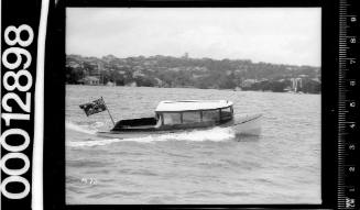 Starboard view of a motor launch on Sydney Harbour