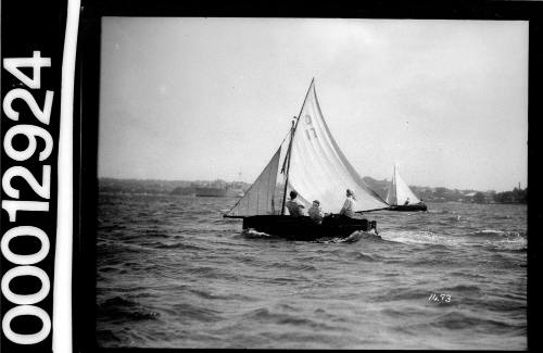 12-foot skiff cadet dinghy on Sydney Harbour