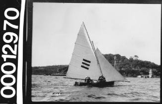 Skiff sailing near Bradleys Head, Sydney Harbour