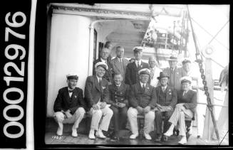 Group of men onboard an unknown ship, possibly during the Pittwater Regatta