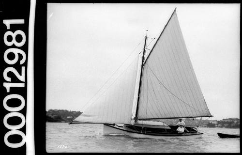 Sailing vessel towing dinghy, Sydney Harbour