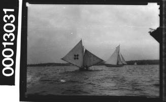 6-foot skiff COMMONWEALTH sailing on Sydney Harbour