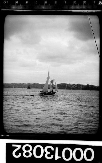 Sailing vessel towing dinghy, Sydney Harbour