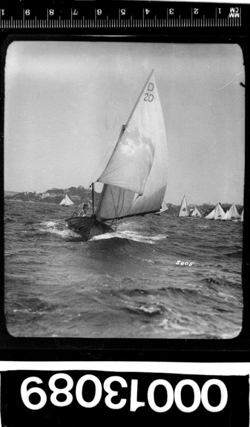 Cadet dinghy D20 under sail on Sydney Harbour