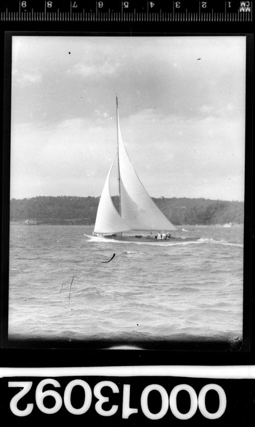 Single masted yacht under sail on Sydney Harbour