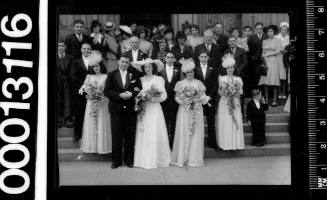 Portrait of wedding party on steps of St Marys Cathedral, Sydney