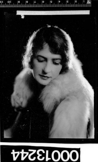 Portrait of a woman wearing a fur coat