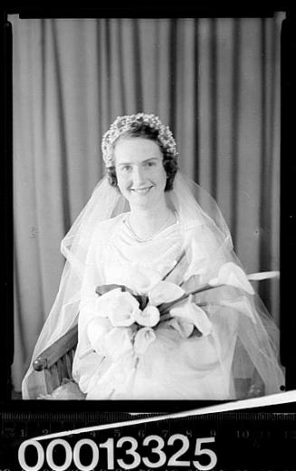 Portrait of a bride holding a bouquet