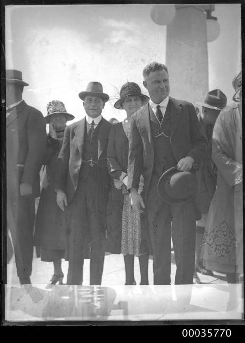 Group of 7 well dressed civilians (4 men, 3 women) middle aged possibly aboard SS ALLER.