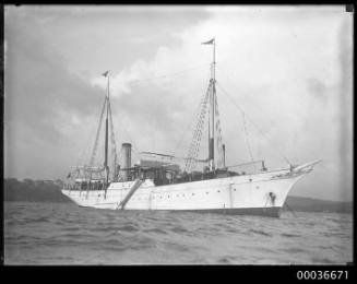 Unidentified steam yacht anchored harbour.