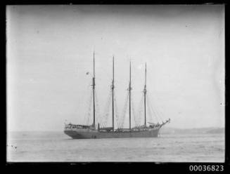 Image of a CARMEN four mast American schooner at anchor.