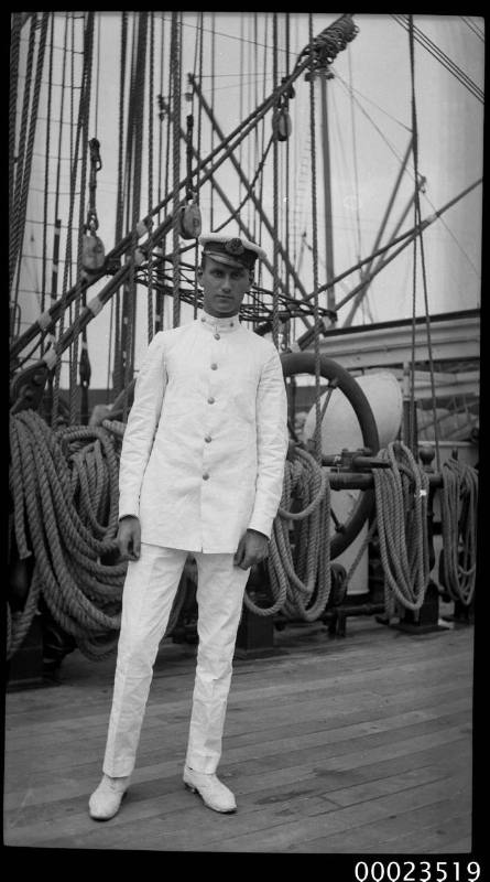 Portrait of a merchant marine officer standing in front of a ship's ...