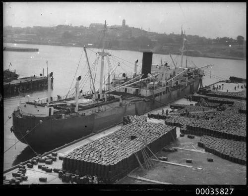 MV NEPTUNIAN unloading oil drums for H C Sleigh at Johnstons Bay in Sydney