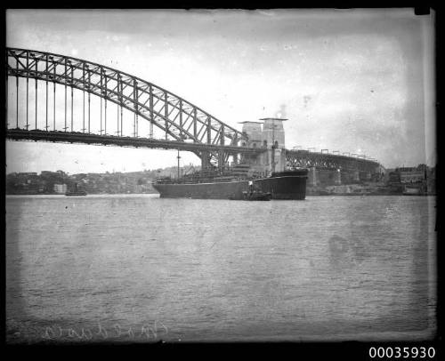 RMS MOLDAVIA II passing under the Sydney Harbour Bridge