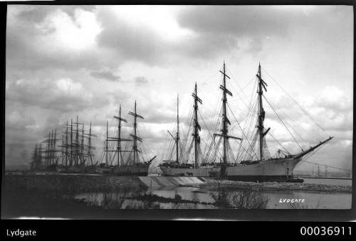 Four-masted barque LYDGATE with other sailing ships