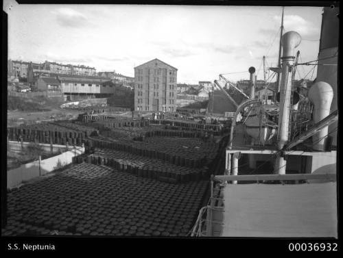 SS NEPTUNIA unloading oil drums in Darling Harbour