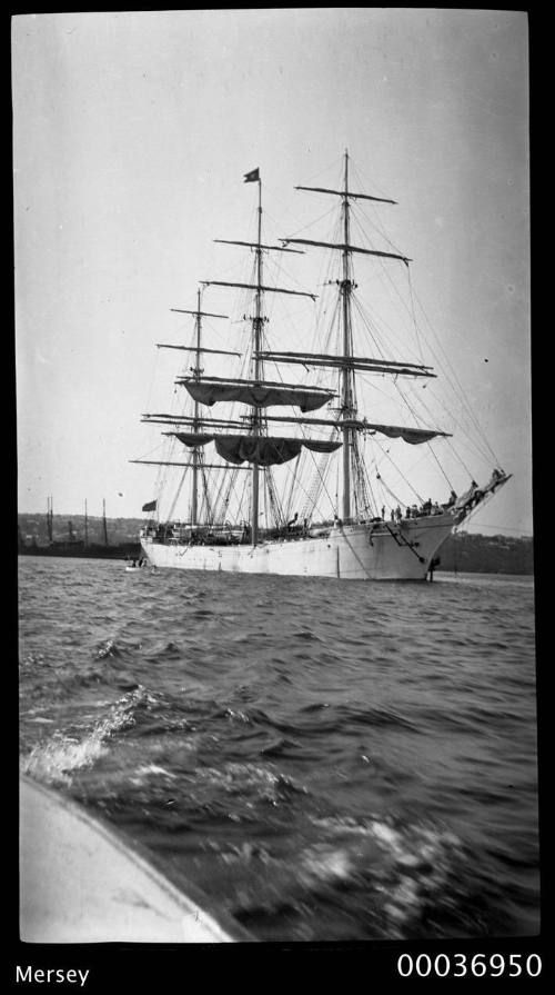 MERSEY at anchor crew preparing sails.